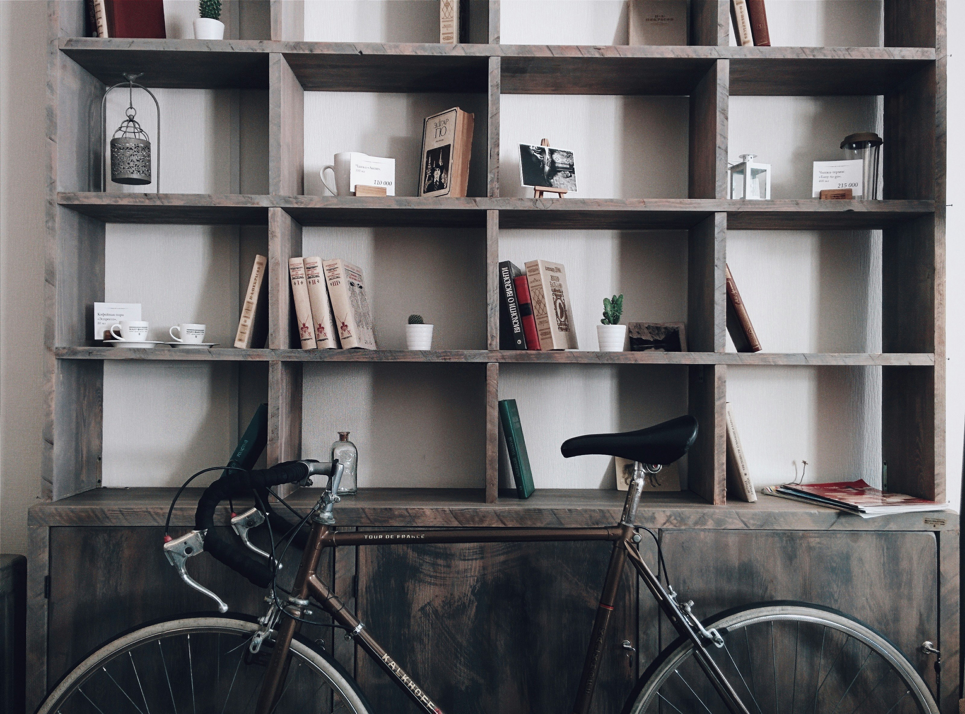 bicycle leaning on shelf